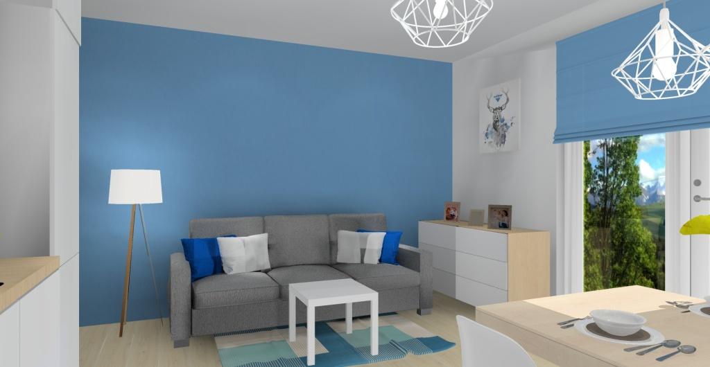 Salon styl skandynawski, ściany białe, niebieskie, komoda biała z drewnem, sofa szara